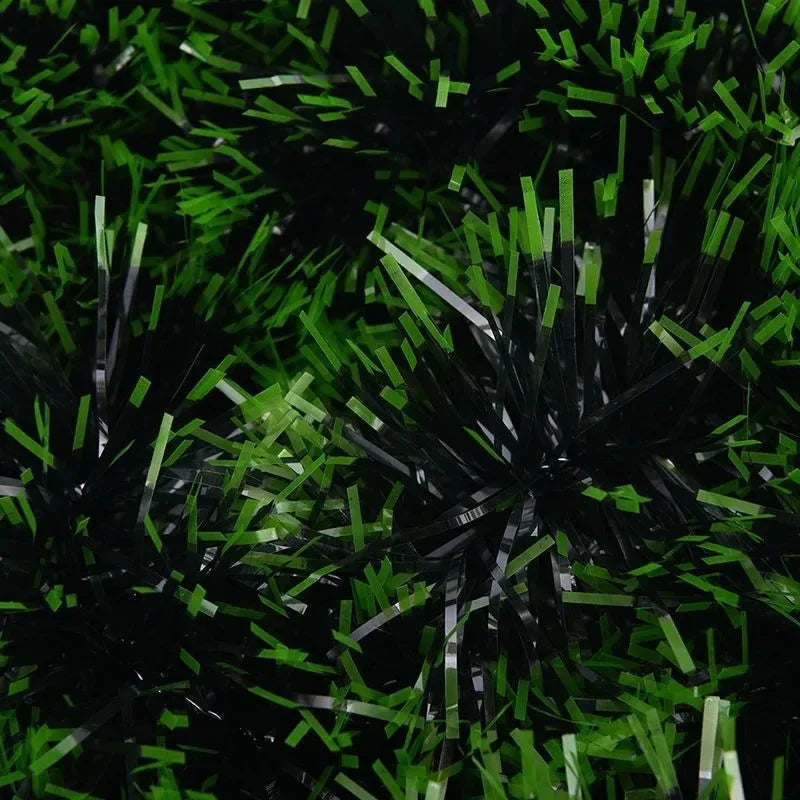 Green and White Christmas tinsel from 2 to 20 meters. For decorating a room or a Christmas tree.