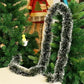 Green and White Christmas tinsel from 2 to 20 meters. For decorating a room or a Christmas tree.