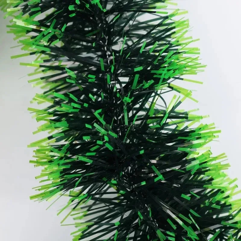 Green and White Christmas tinsel from 2 to 20 meters. For decorating a room or a Christmas tree.